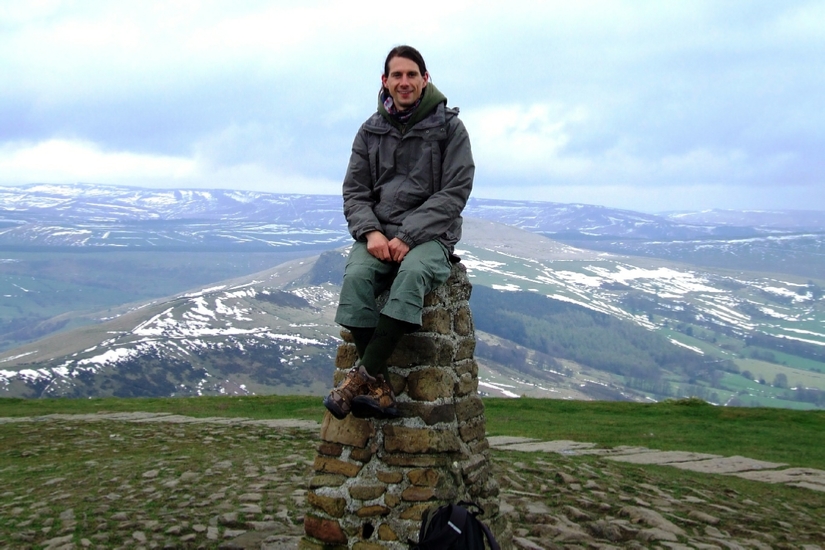 Laszlo sitting on the summit of Mam Tor